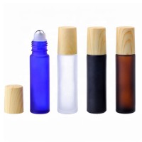 Portable 10ml  Amber Clear Blue Green roll on glass cosmetic bottle sample vials with  metal wood lid